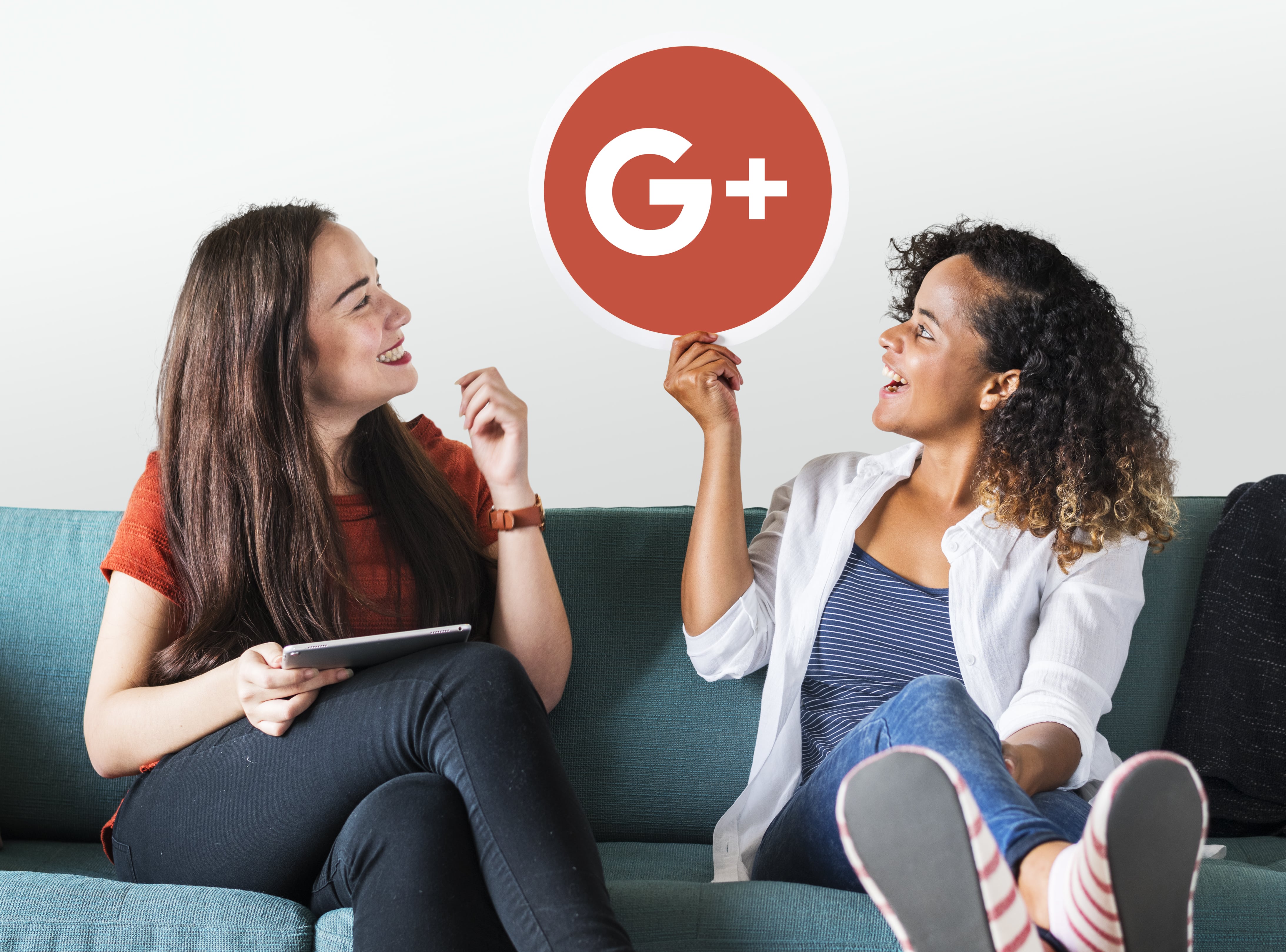women-holding-google-plus-icon-min